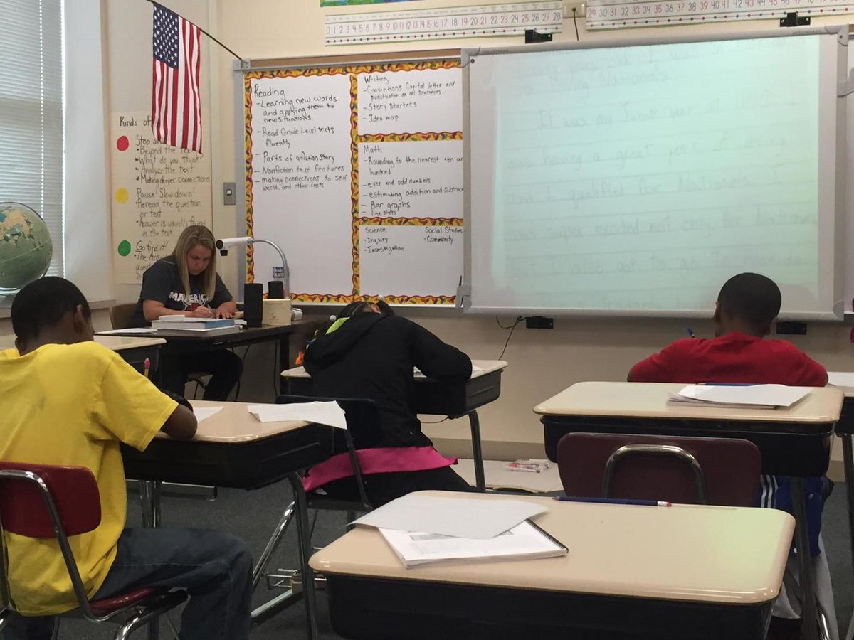 OPS_CentralPark's tweet image. Ms. Kafka is writing her personal narrative along with her student during writer's workshop. #modelingworks