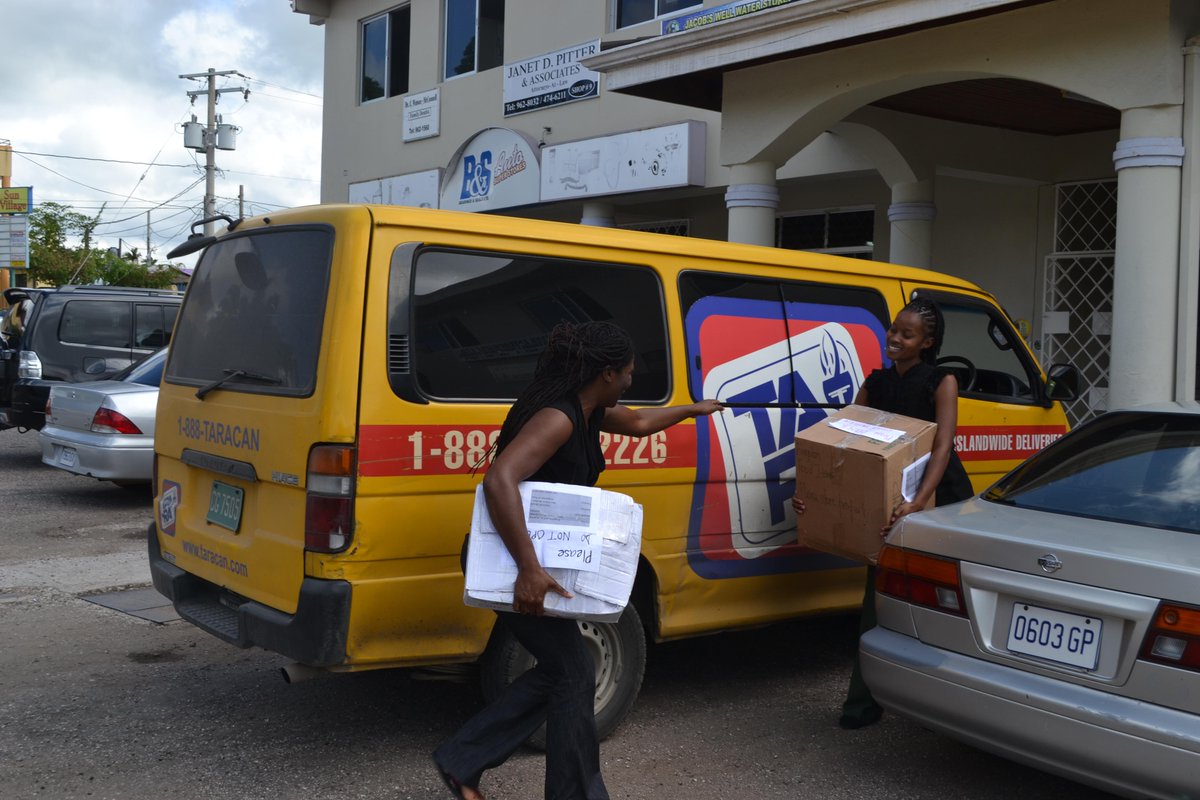 SHAREOperation's tweet photo. Boxes with care packages being delivered free of cost by Tara Couriers to three parishes. #OperartionSHARE http://t.co/iwDxNTftzy