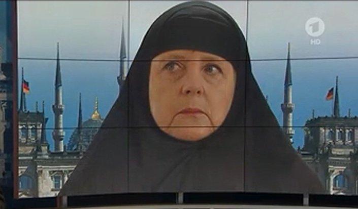 20m_genteytv's tweet photo. La TV alemana "cubre" con el 'hijab' a Merkel mientra habla de la crisis de los refugiados http://t.co/6RnwgbkRR5 http://t.co/uRmfDnngen