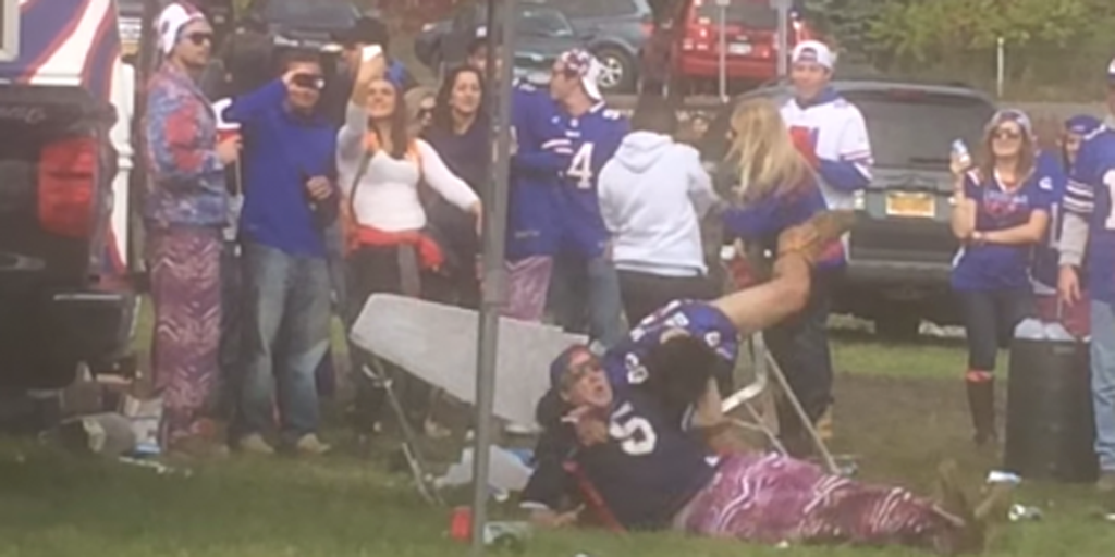 theScore's tweet photo. VIDEO: This RKO at a Bills tailgate party.... CAME OUT OF NOWHERE! http://t.co/hdfSxFCVAo http://t.co/RbbqZUavo2