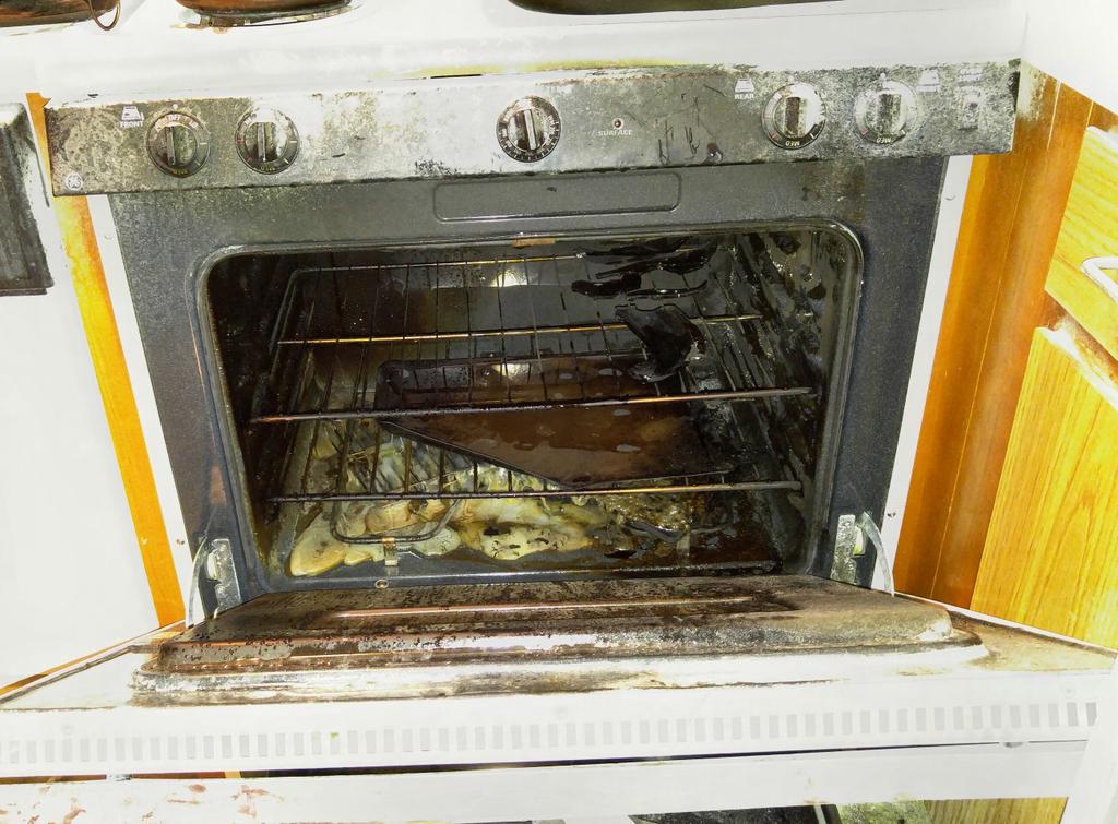 greenfieldfire's tweet image. Careful what's stored in oven. Here's Tupperware, oven knob bumped, started fire, lots of smoke #FirePrevention