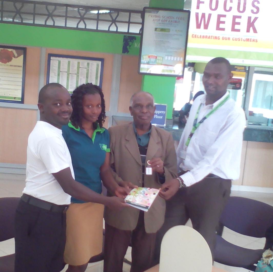 StephenWanjau7's tweet photo. @KCB Othaya A loyal customer since 1963 honored with refreshments and gifts #CSWeek2015  #KCBLovesYou  #TBT http://t.co/7AKgJGqfg1