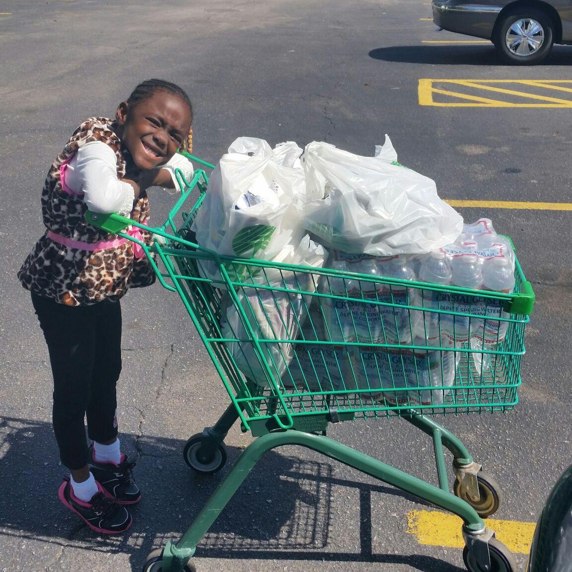 Little Bobcat volunteering at Flora - she brought supplies and donated a lot of her toys! #schoolfamilylove