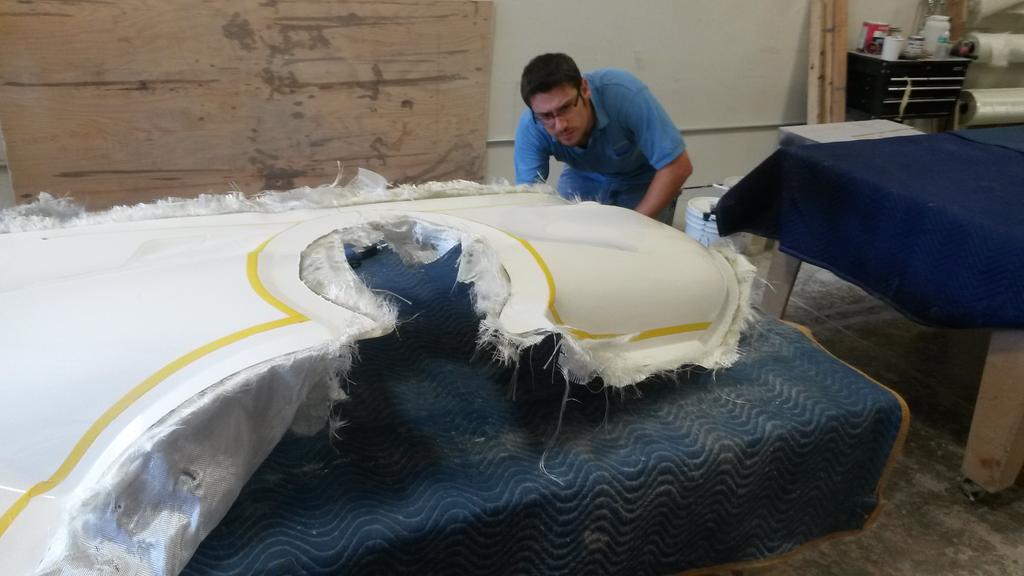 GinzVelo's tweet photo. President of GinzVelo, Peter Ginzburg inspecting a fresh glow in the dark GinzVelo before body trimming. http://t.co/xCbERXXerK
