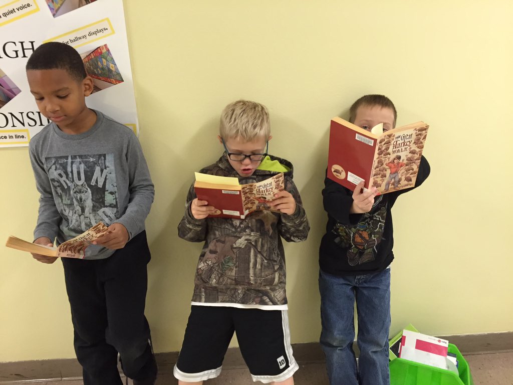 lisa_m_rieger's tweet image. Second grade boys glued to a great book! 
#icsdplc