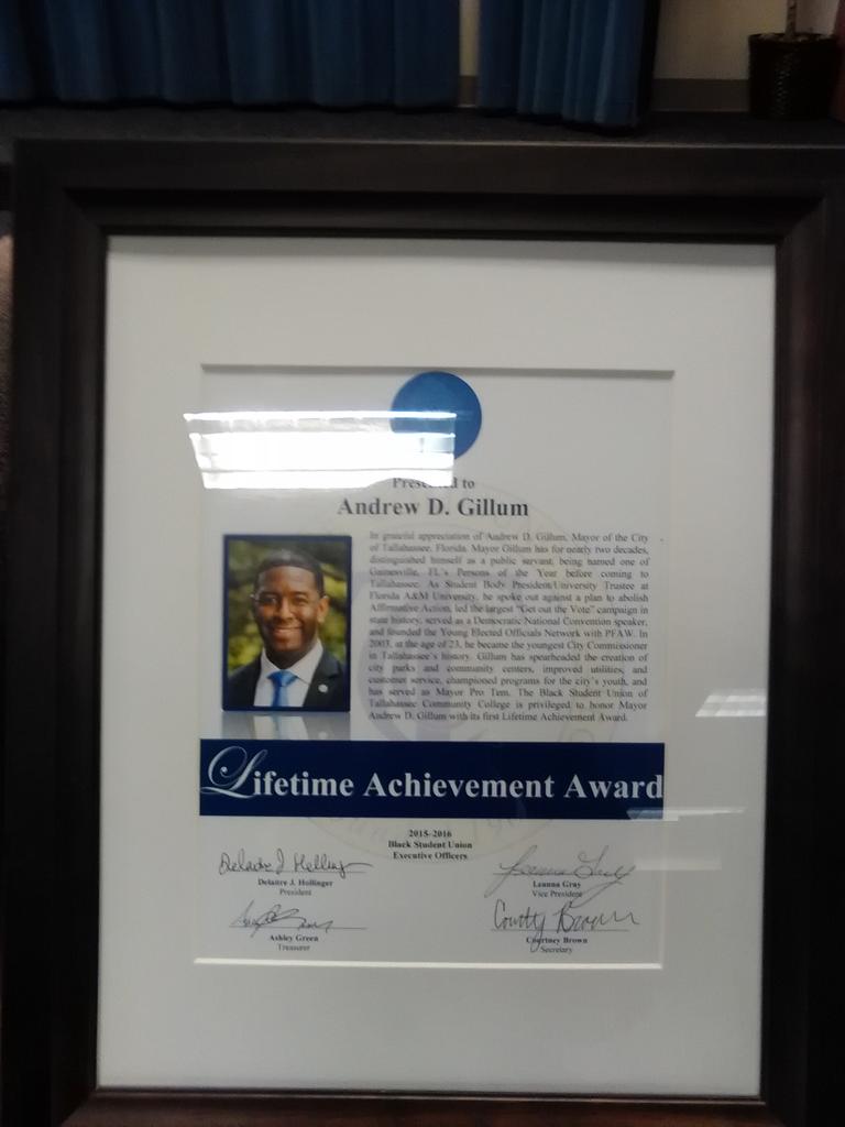 TCCBSU's tweet photo. Mayor @a_gillum is presented with the @GoToTCC #TCCBSU Lifetime Achievement Award #BSUForward https://t.co/gGlE8dX4jB