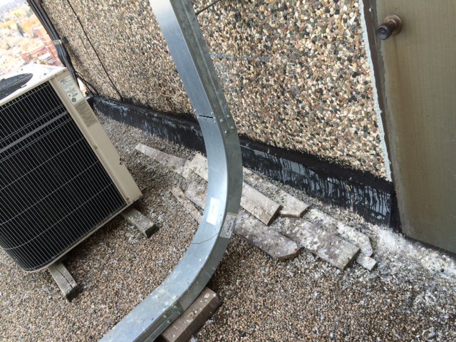 Builders - It costs many millions to construct towers - put a proper door threshold in so roofs don't leak. #builder