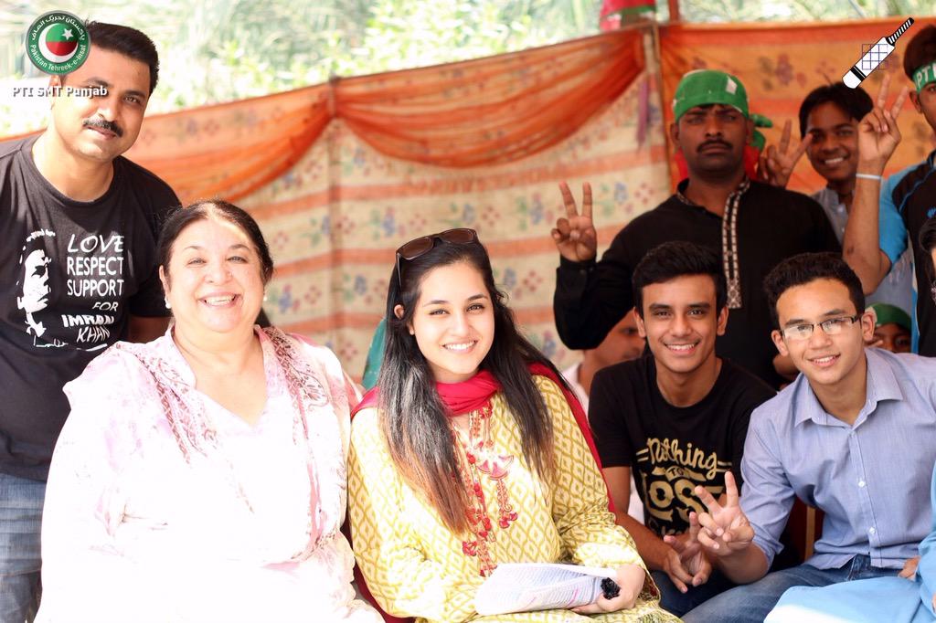 PTIofficial's tweet photo. Chairman @ImranKhanPTI has always promoted women involvement in politics- they are taking the lead #BallayPeThappa http://t.co/YfTj6Ne882