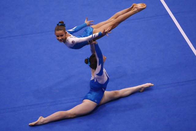 What is Acrobatic Gymnastics? buff.ly/1LdE9tZ #Strength #Flexibility #Power <a href="/BodystudioE2/">Body Studio</a>