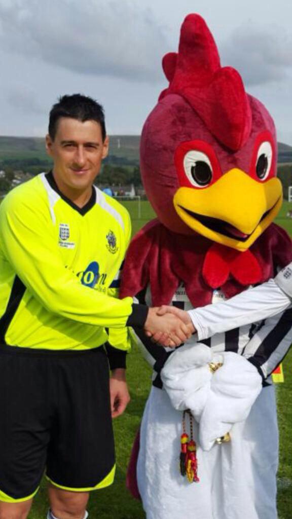 oldboltsafc's tweet photo. Captain Dave Warburton with 'Bolt' the cockerel, the clubs first ever mascot http://t.co/yd9ueRASai