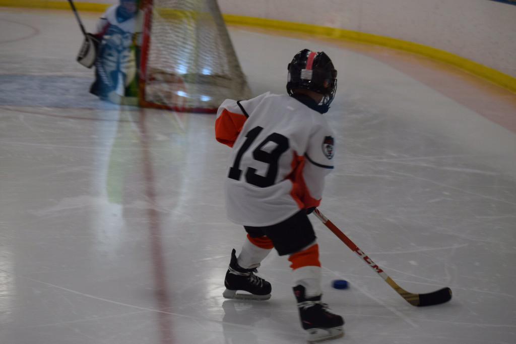 SpartanSutton's tweet image. Garrett had his first two hockey games of the season this morning. He played great and had a lot of fun! #MiniMite