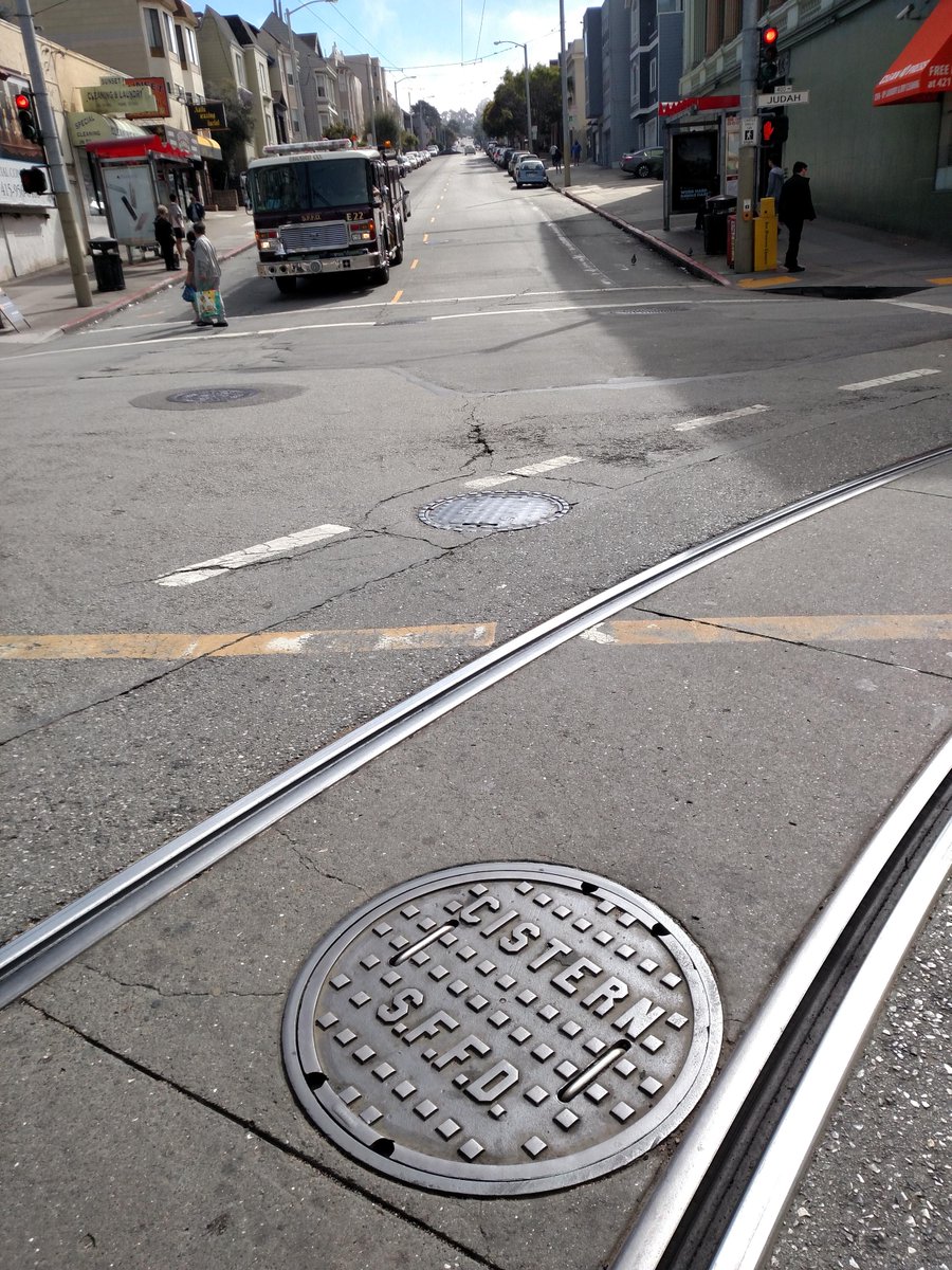 cisternmapper's tweet photo. With fire truck in background, Cistern #138, Judah &amp; 9th, 37.762237, -122.466214 http://t.co/AQjdGWVVqZ