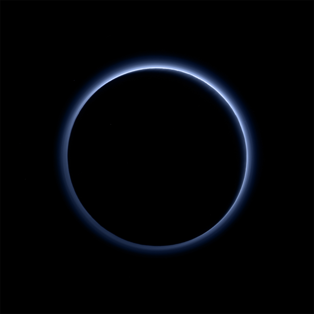NASA's tweet photo. The blue tint in Pluto’s haze seen by @NASANewHorizons gives us info about composing particles http://t.co/iFi4KCpp5c http://t.co/CRdFZ9y0r6