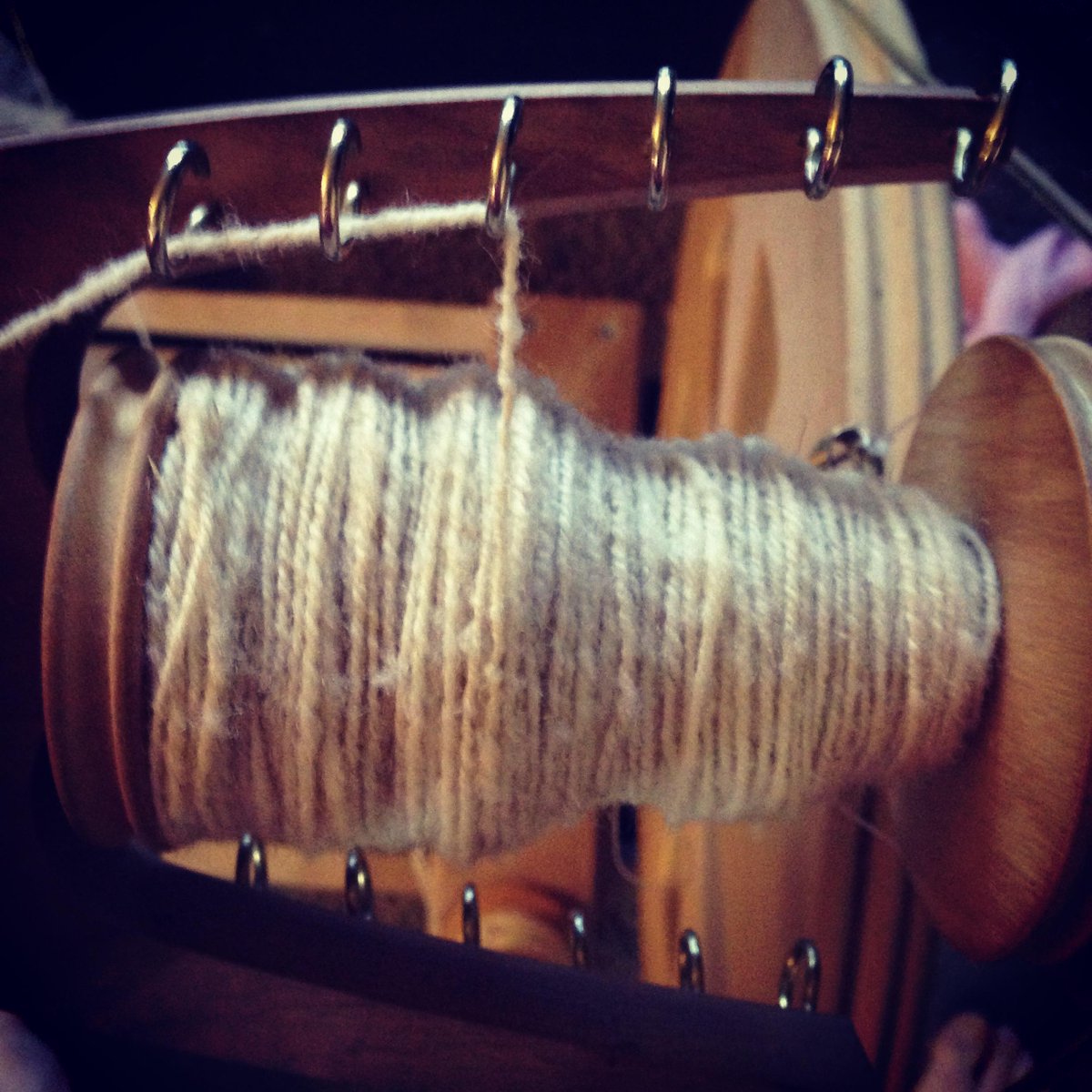 RCozyKnits's tweet photo. Back to my wheel. Yikes, I've gotten behind!  3 ply Cal Red. #handspinning #calred #wool http://t.co/T5pbuauxBv