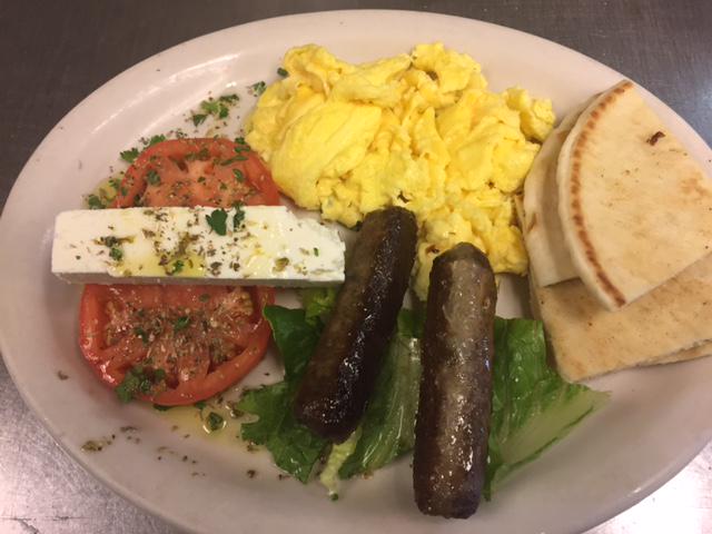 Awesome Greek Breakfast: 2 scrambled eggs, sausage, sliced tomatoes &amp; feta - drizzled w/ olive oil &amp; oregano.