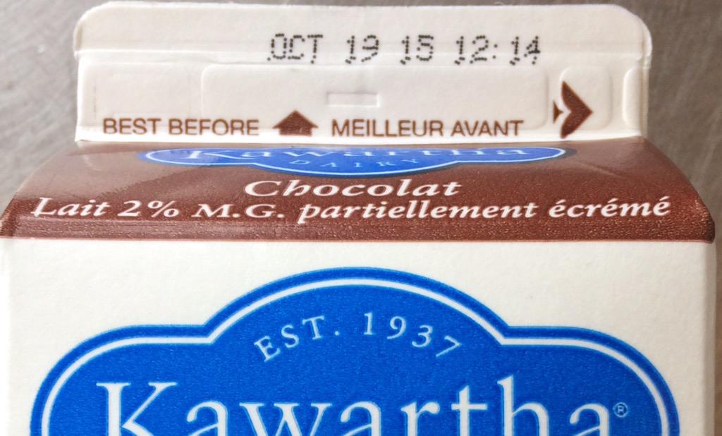 FarSidePtbo's tweet photo. Does this chocolate milk vote Conservative? Best before October 19th? C'mon. http://t.co/5Xu10vOduP