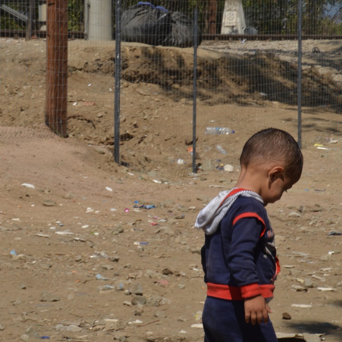 A21's tweet image. YOUR support of the #RefugeeCrisis allows us to give clothing and shoes to children in need. A21.org/RefugeeCrisis