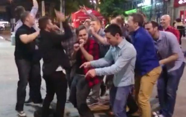Watch the hilarious moment a stag do joins in with a singer in Liverpool city centre bit.ly/1LsaPU0