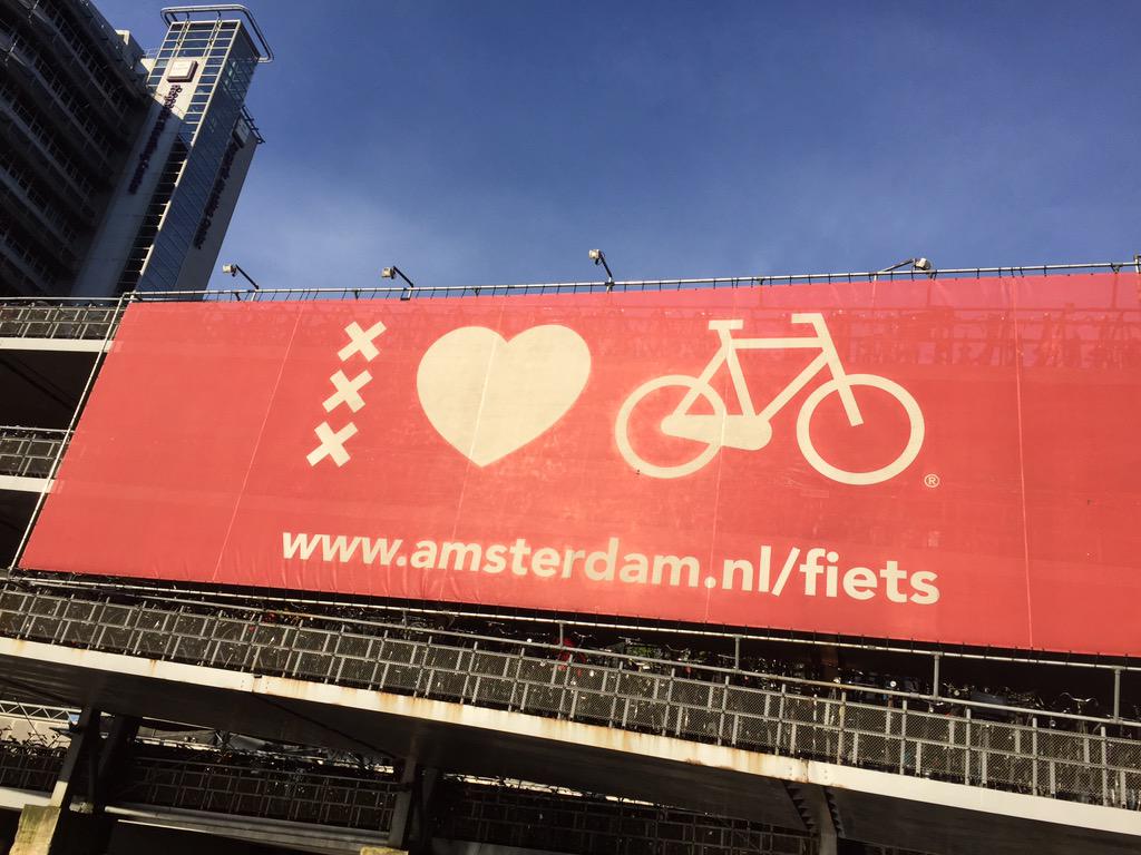 RachelToovey's tweet photo. Happy #Ride2work day! Sign covers storage for >60,000 bikes of ppl who #Ride2Work in AMS #ddrrontour @CRE_CP #cpbike http://t.co/v0H3nEQTGw