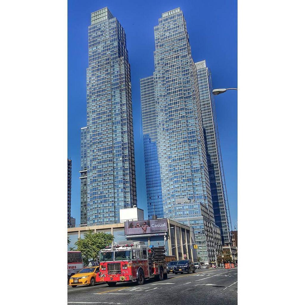 AFireStation's tweet image. Found this cool photo, not mine This is #Engine34 in front of th luxurious #SilverTowers on 42nd Street in #HellsKi…