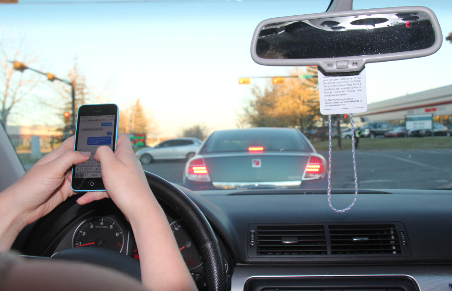 thestarcalgary's tweet photo. Distracted driving? There's a fine for that. And it's making the province millions. http://t.co/1BhfGWnhTX #yyc http://t.co/xsg67TFRlD