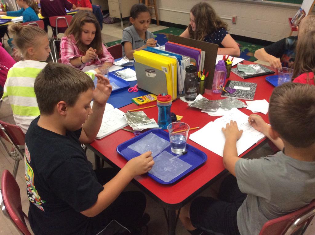 Rachelhowe52's tweet photo. 3rd graders observing how water acts on different surfaces. #essdexcels http://t.co/1P2GrngSIz