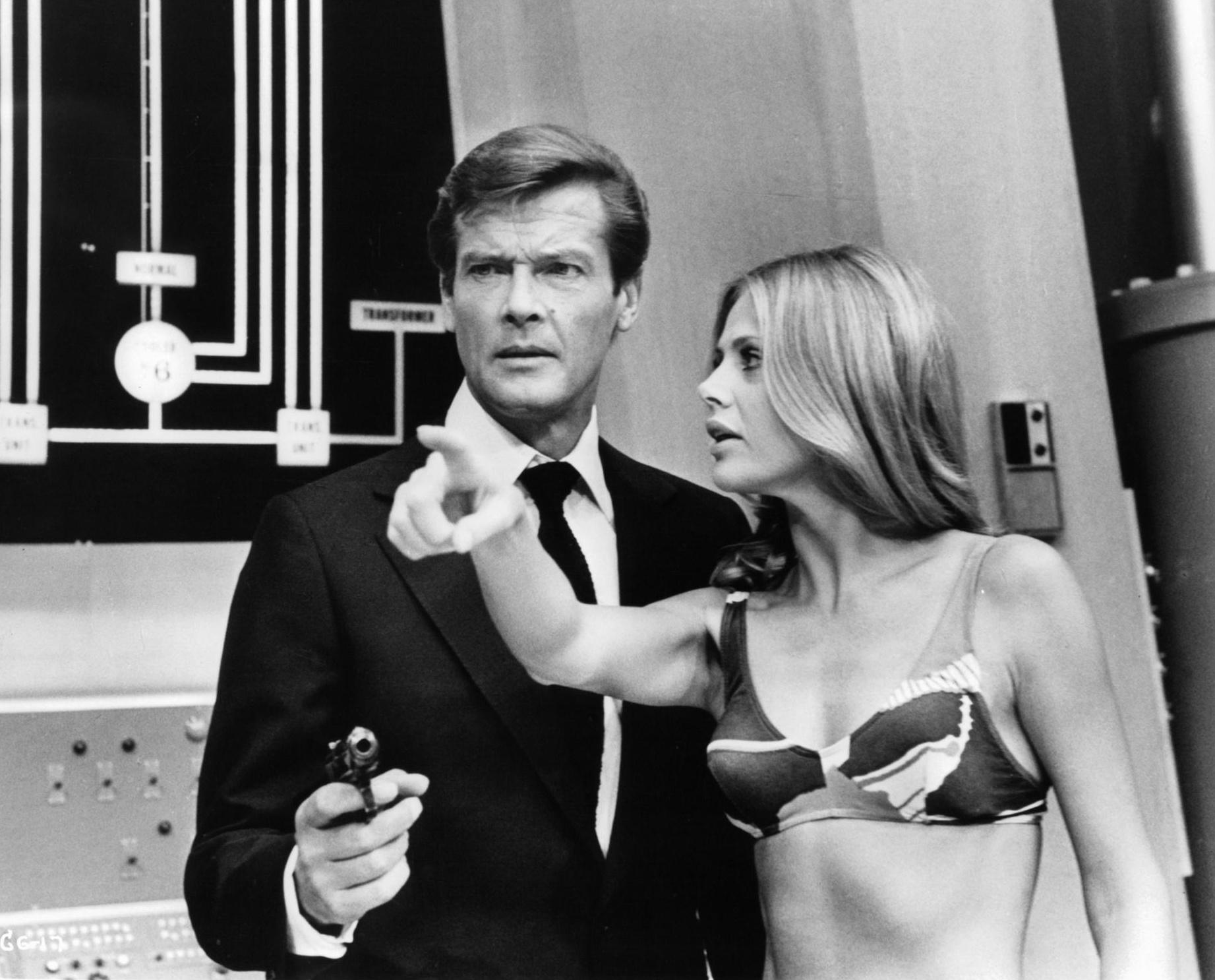 \" Roger Moore and Britt Ekland in THE MAN WITH THE GOLDEN GUN    1974.  Happy birthday Mr. Moore. 