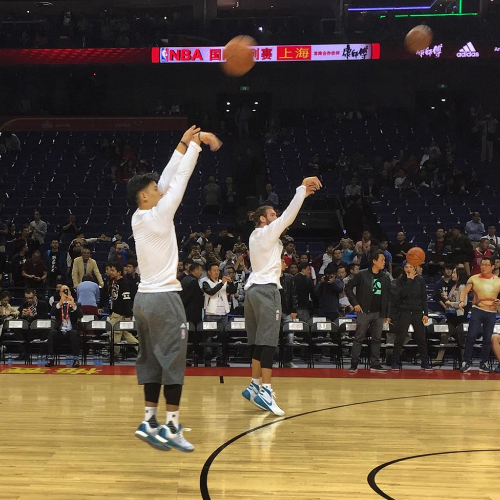NBA's tweet photo. The @hornets' @JLin7 &amp; @spencerhawes00 launch treys prior to the #NBAGlobalGames in Shanghai. http://t.co/xqXlD1YEer