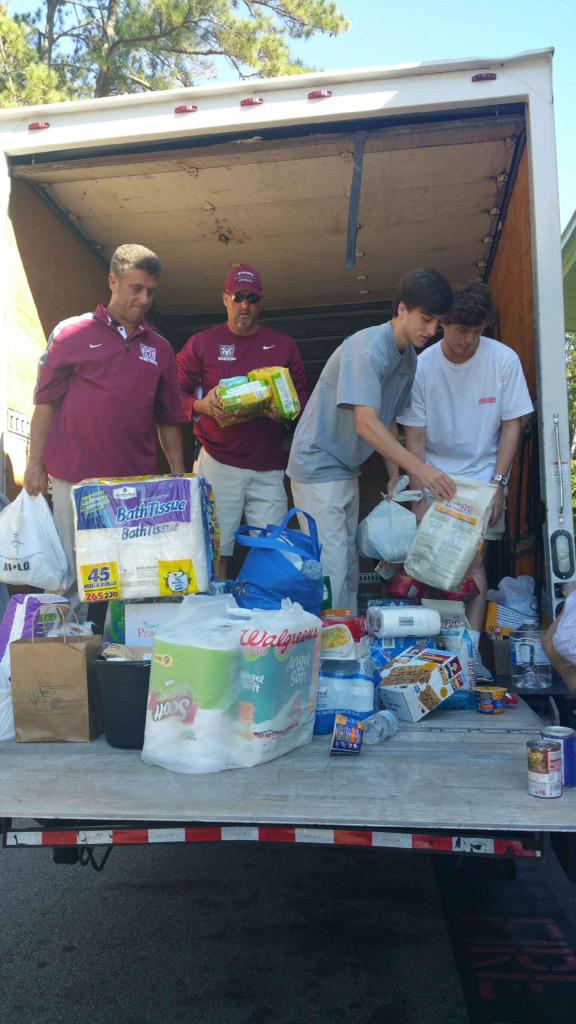 RamsFootballSC's tweet image. Unloading the truck!! Giving back to those devastated by the floods. #RollRams #Settinganexample