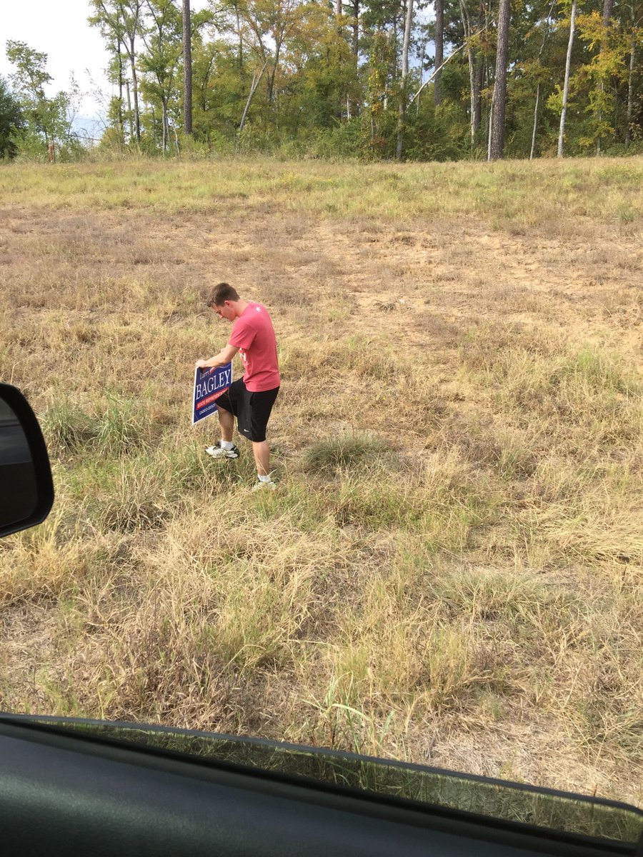 Taylor Caldwell, Hunter Bagley and I putting out signs in District 7. larrybagley.com