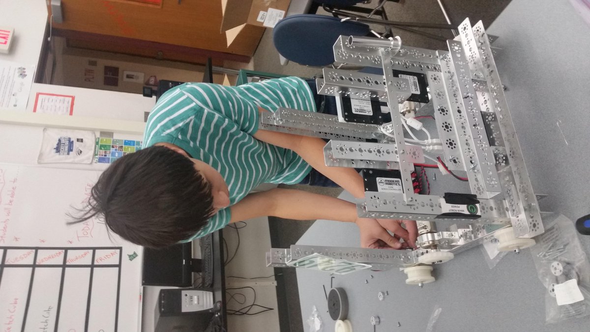 ETRobotics's tweet image. Hard at work...
Last year they messed up the chassis, so now we have to fix it.