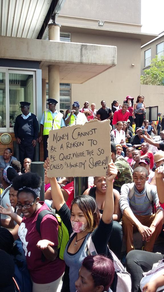 Zimasa91's tweet image. Some of the placards read "We cannot afford to be silent" "Black Lives Matter" #WitsShutDown #WitsFees