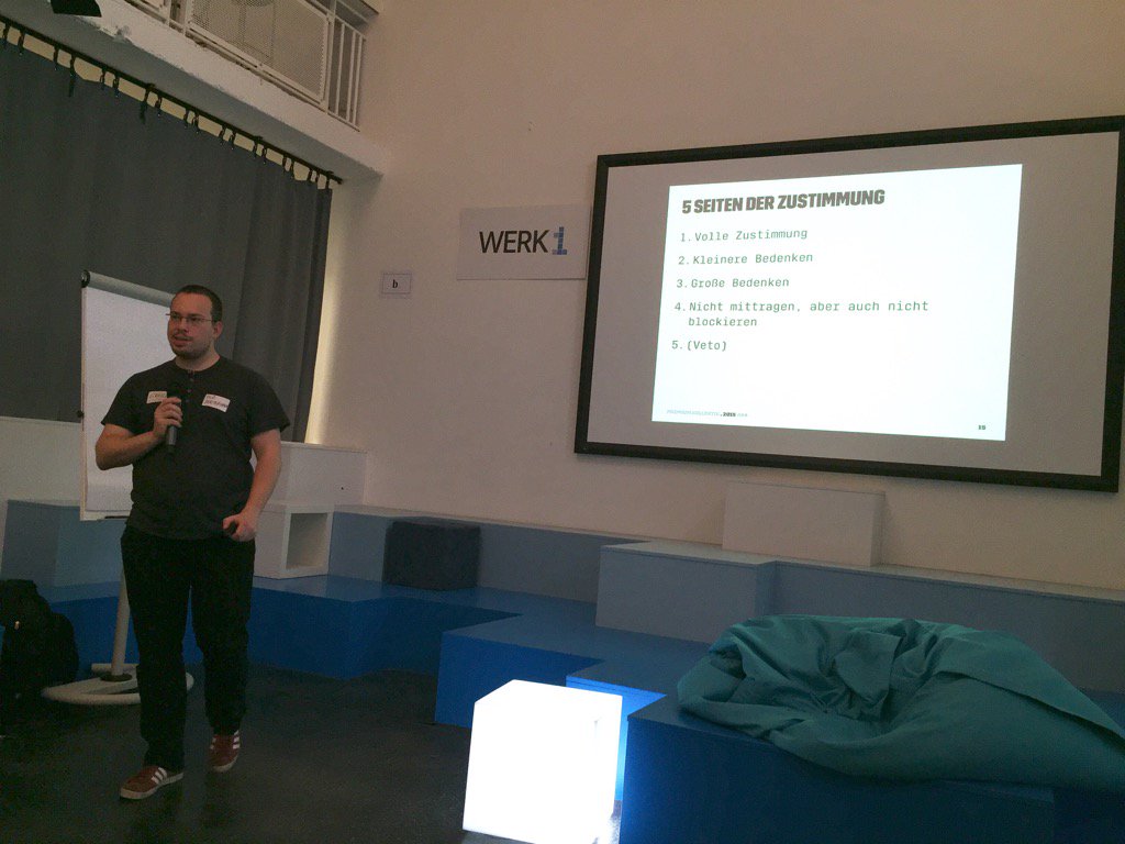 ulfbrandes's tweet image. Finding consensus with 1690 people: Gregor of @premiumcola explains their 5 shades of yes or no. #beyondagilecamp