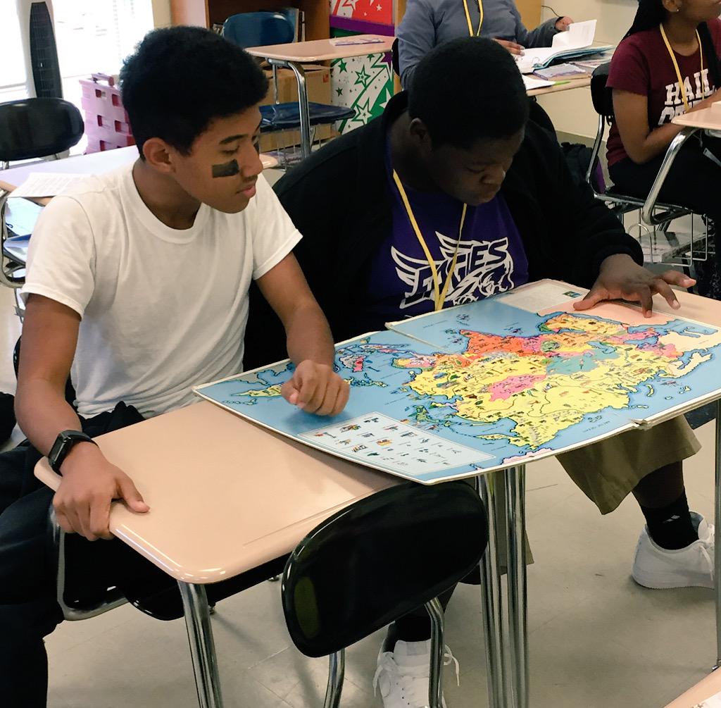 MsPaes's tweet photo. These boys were interested in geography after they finished their work! #AMSPatriots #NotPosed @ArmstrongMiddle http://t.co/2PCZEmBa6N