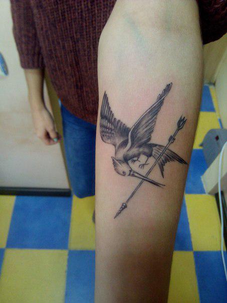 Hdtattoogirls.com | Hunger games tattoo, Gaming tattoo, Tattoos with meaning