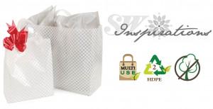 LandLpackaging's tweet photo. I really love the #Houndstooth pattern and @swalterpkg has #bags w/ this pattern! http://t.co/K7QvnIY9xA http://t.co/hWAKeNEI4K