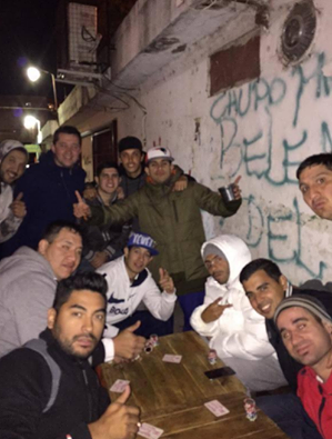 FootballFunnys's tweet photo. Carlos Tevez plays cards with his friends in the ghettos of Buenos Aires.

 Never forget where you came from. http://t.co/wekvDalW2C