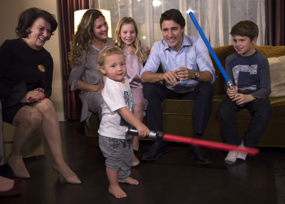 CBCNews's tweet photo. Trudeau kids play with lightsabers after Star Wars trailer drops #elxn42 (Paul Chiasson/CP) https://t.co/sp7086gpQd https://t.co/SZPVfq5bWS