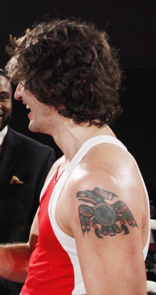 side view of Canada's Trudeau's upper left arm tattoo of an eagle