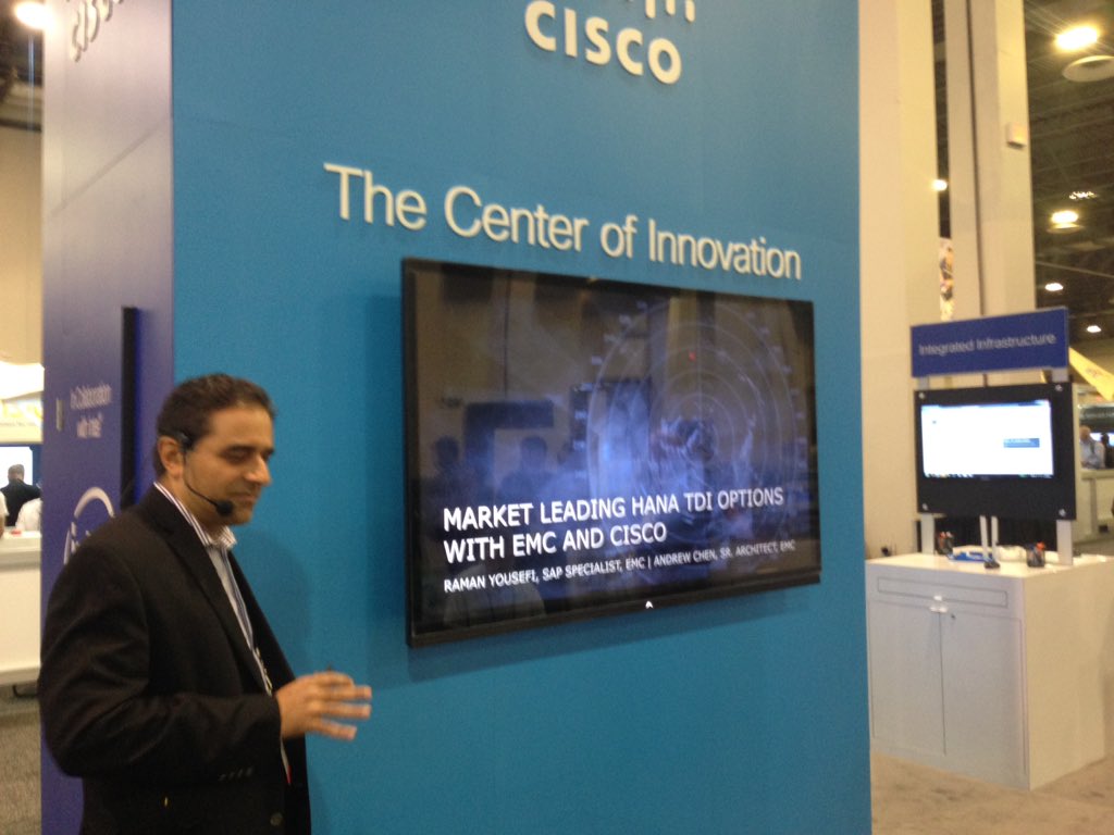 RollZanzucchi's tweet image. At the Cisco booth my friend Raman on stage #SAPtd #EMCSAP woW