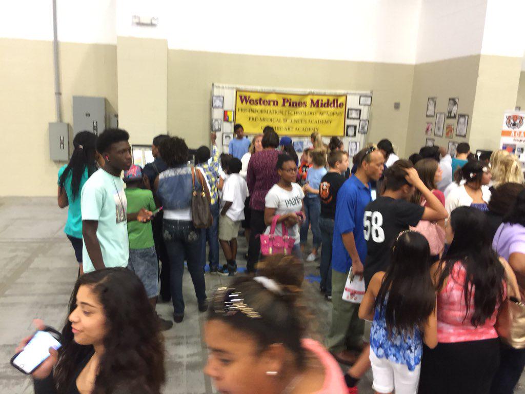 Showcase of Schools.  Doors just opened and we have standing room only in our booth. The Pines Life is the Good Life