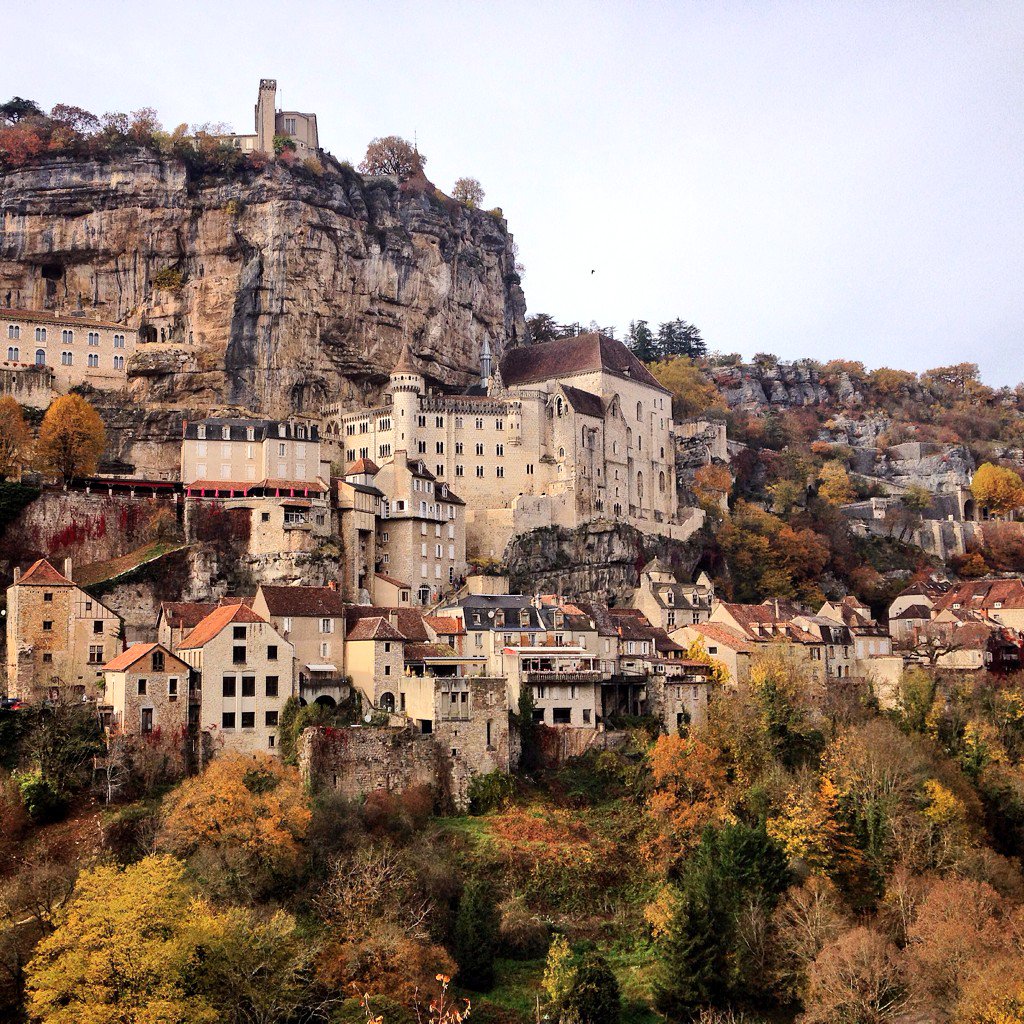 tripalong's tweet photo. The mind boggles to think how medieval builders wedged the pilgrimage site of Rocamadour into the rock #France #lp https://t.co/uiCZ7sLuvE