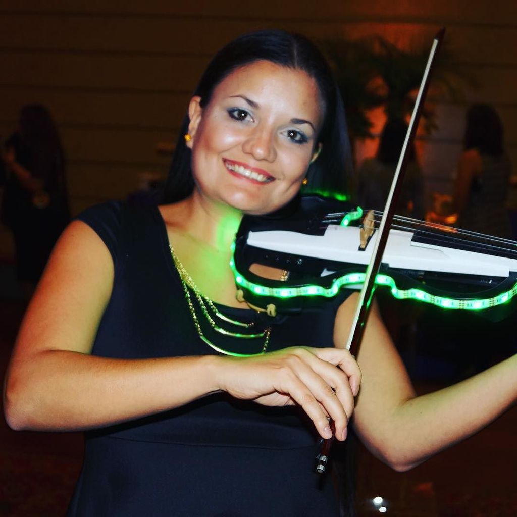 BittonEvents's tweet photo. Our LED violinist at the annual event for the Epilepsy Foundation of Florida! #EFOF #bitto… https://t.co/ekAcKjAVYX https://t.co/dEbKPUe8sQ