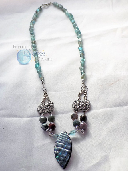 beyondthemoond1's tweet photo. 18-20 " Strung blue focal necklace w/ agates,Czech glass beads, 
Tibetan Silver conectors&amp;ceramic/paua enlay focal. https://t.co/wvwnubXyFe