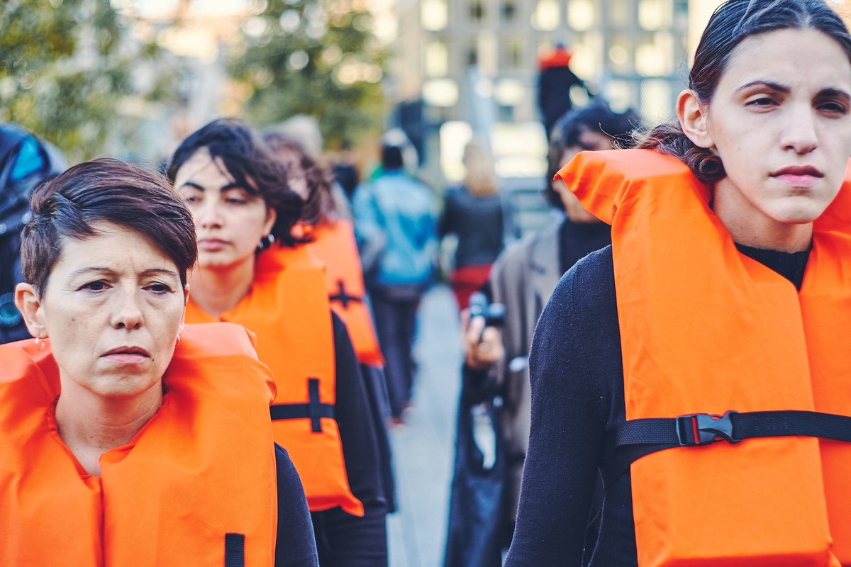 LaleGeorgia's tweet photo. #orangevest for #syrian #refugees. #OpenEUborders Now. @melissarfleming @KentPage https://t.co/HArgyg7V85