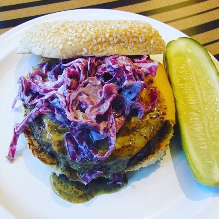 bobbysburgerpal's tweet photo. You're looking at our #CarolinaBurger topped with smoked American cheese, green onion slaw and mustard BBQ sauce. https://t.co/ItxZx3QV2F