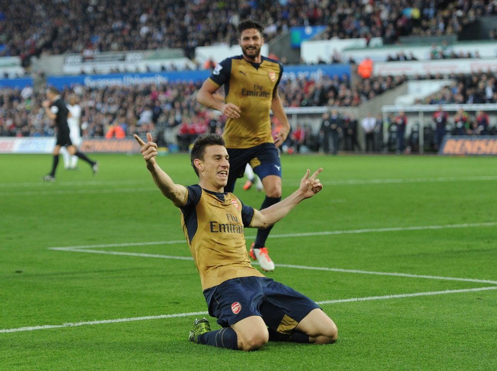 Arsenal's tweet image. ANALYSIS: @adrianjclarke says @Arsenal comfortably passed “a true test” vs Swansea arsn.al/rn8OYh #SCFCvAFC