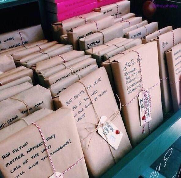 ComedyPosts's tweet photo. A book store where books are wrapped in paper with short descriptions so no one will 'judge a book by it's cover https://t.co/QfGS1d0yIu