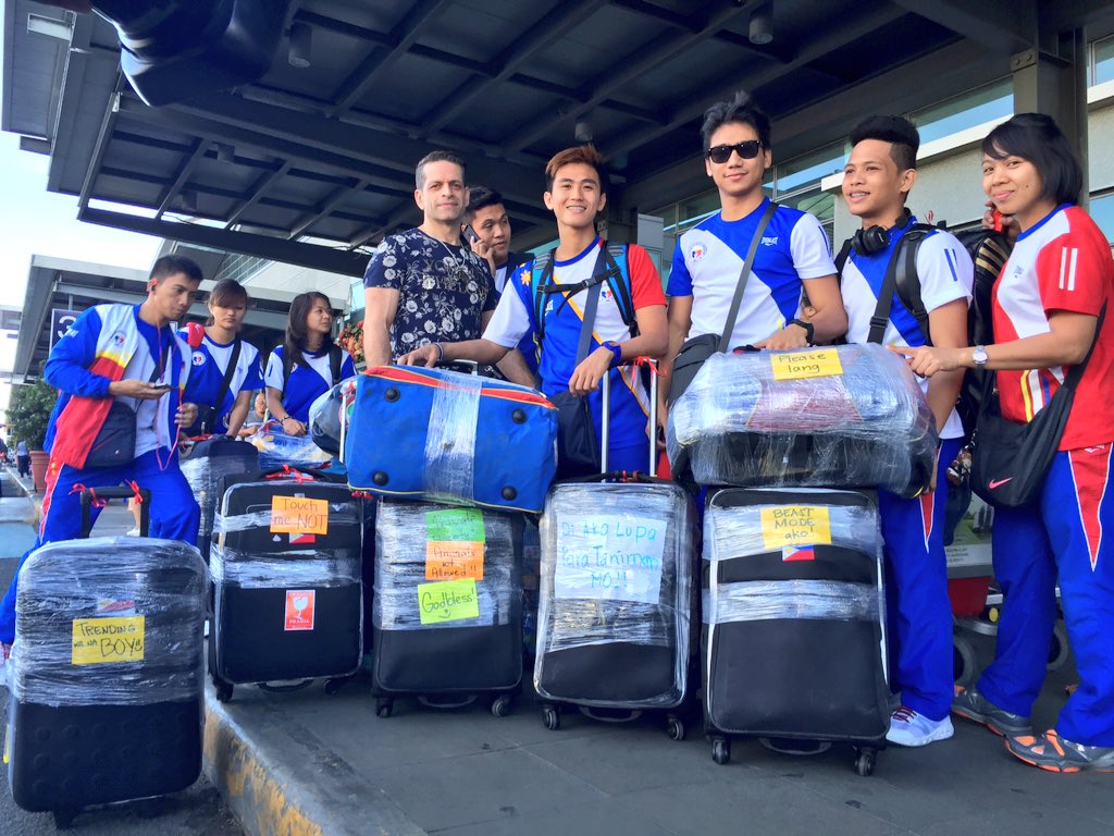 ABSCBNNews's tweet image. "Di ako lupa para taniman mo." Philippine Karate team at NAIA T3 puts note on their luggage.  | via @jacquemanabat