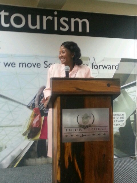Deputy Minister of Tourism Tokozile Xasa addressing learners during the #KZNTourismBuddies at Jozini Tiger Lodge